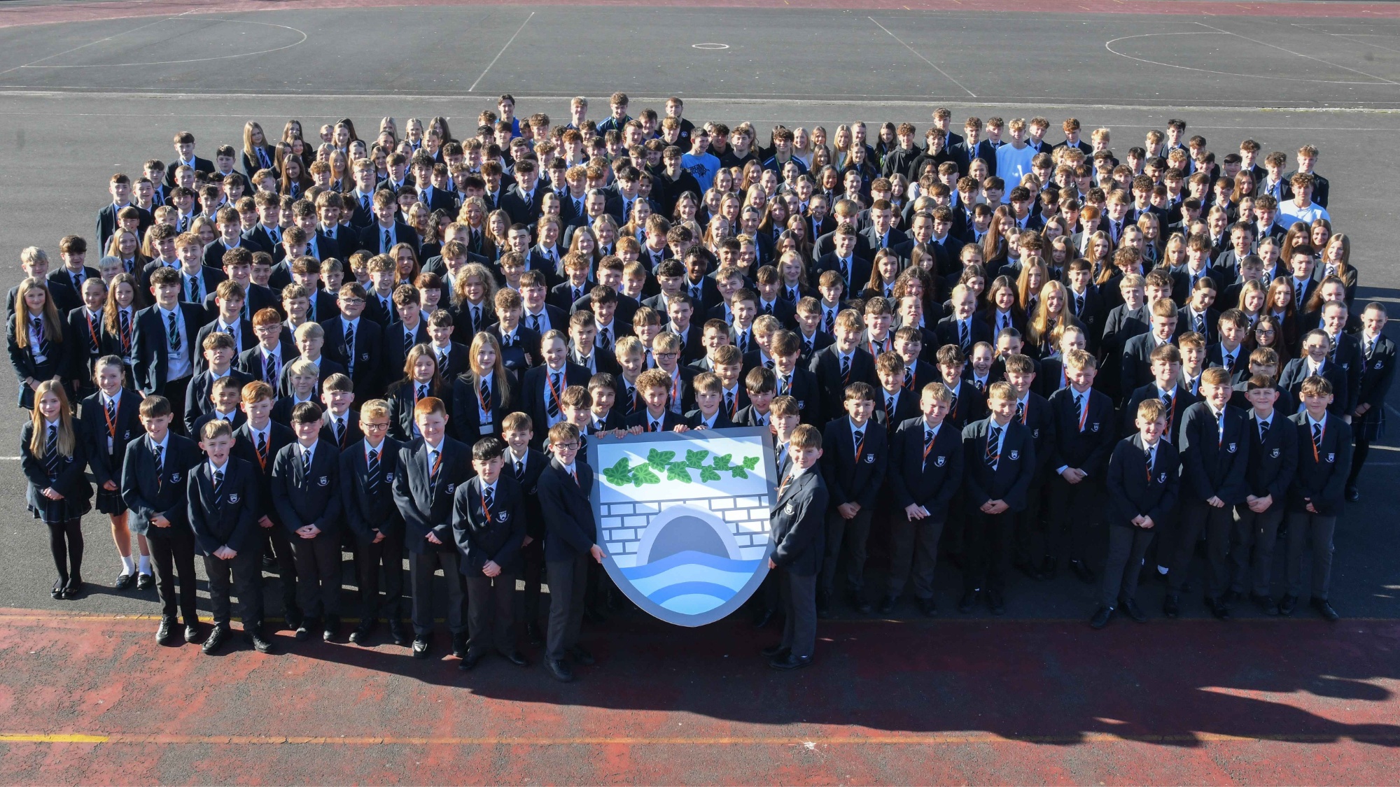 Ivybridge Community College Year group with shield